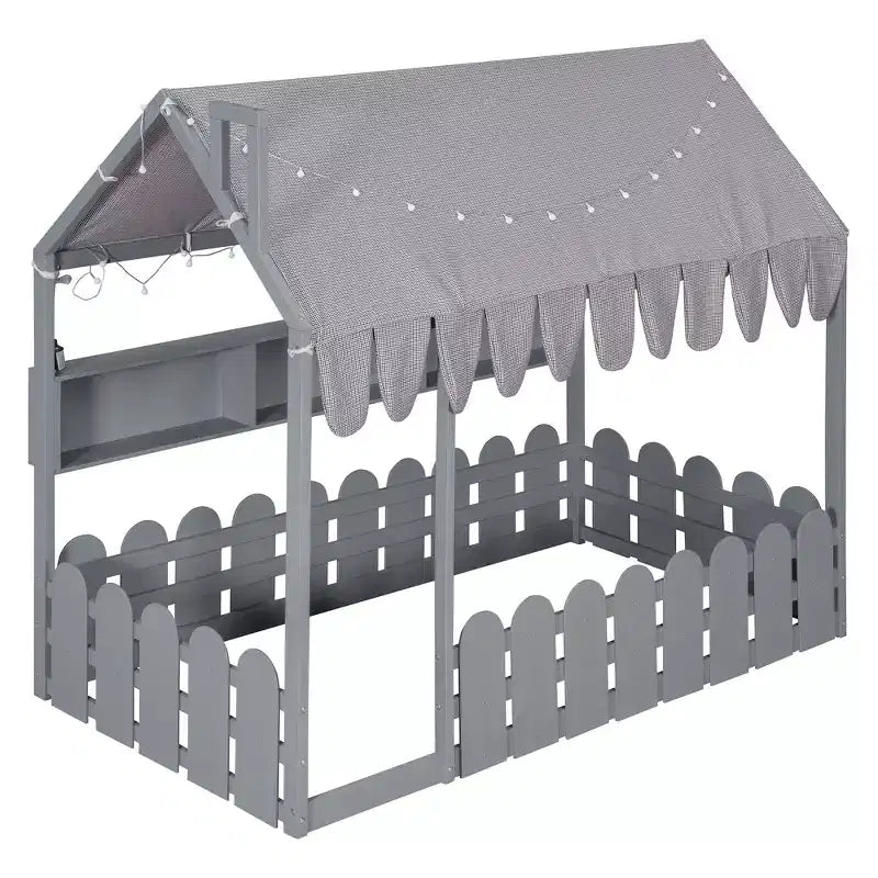 Lit cabane avec barrières et toit de tente