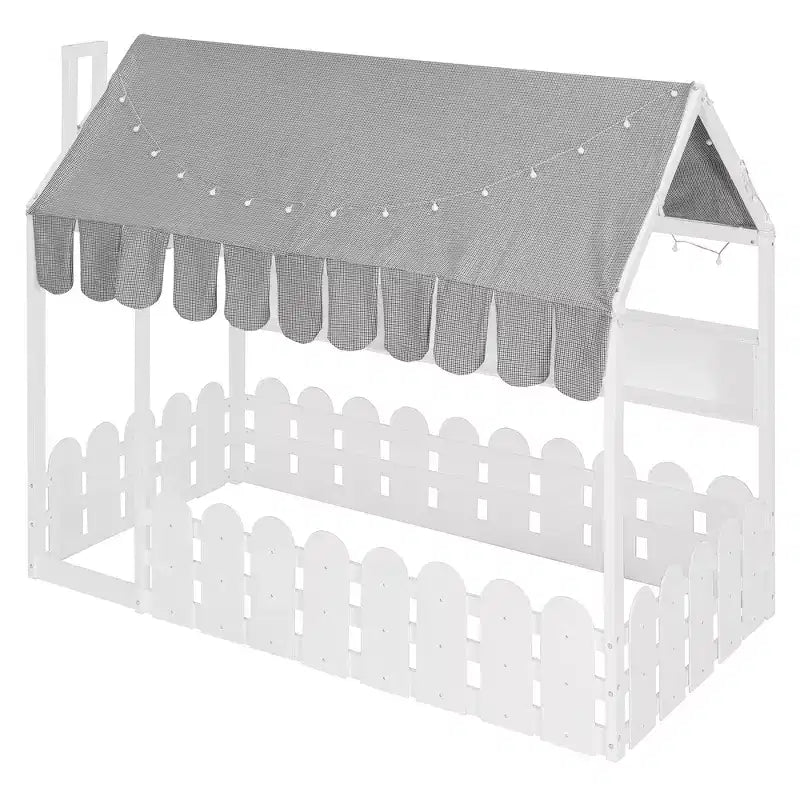 Lit cabane avec barrières et toit de tente