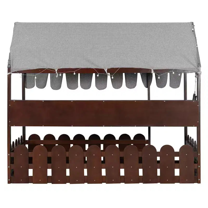 Lit cabane avec barrières et toit de tente